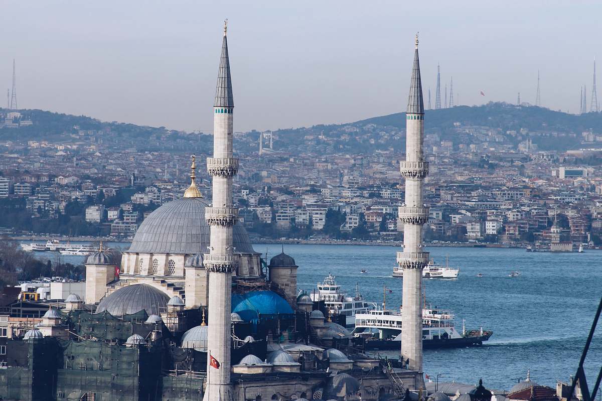 building blue mosque near body of water dome