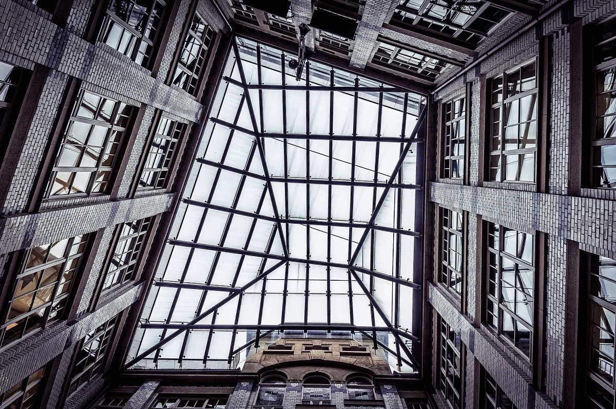 building bottom view of glass building structure