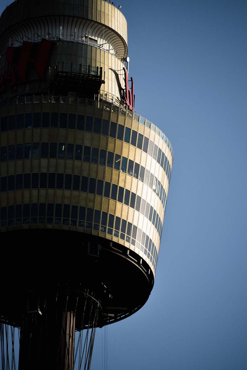 building brown and blue concrete buildng tower