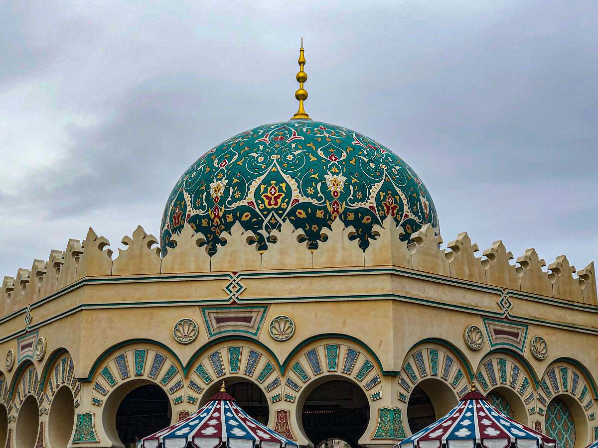 building brown and green mosque dome