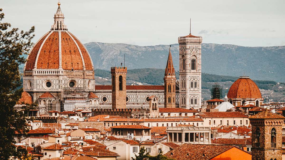 building brown and white buildings at daytime dome