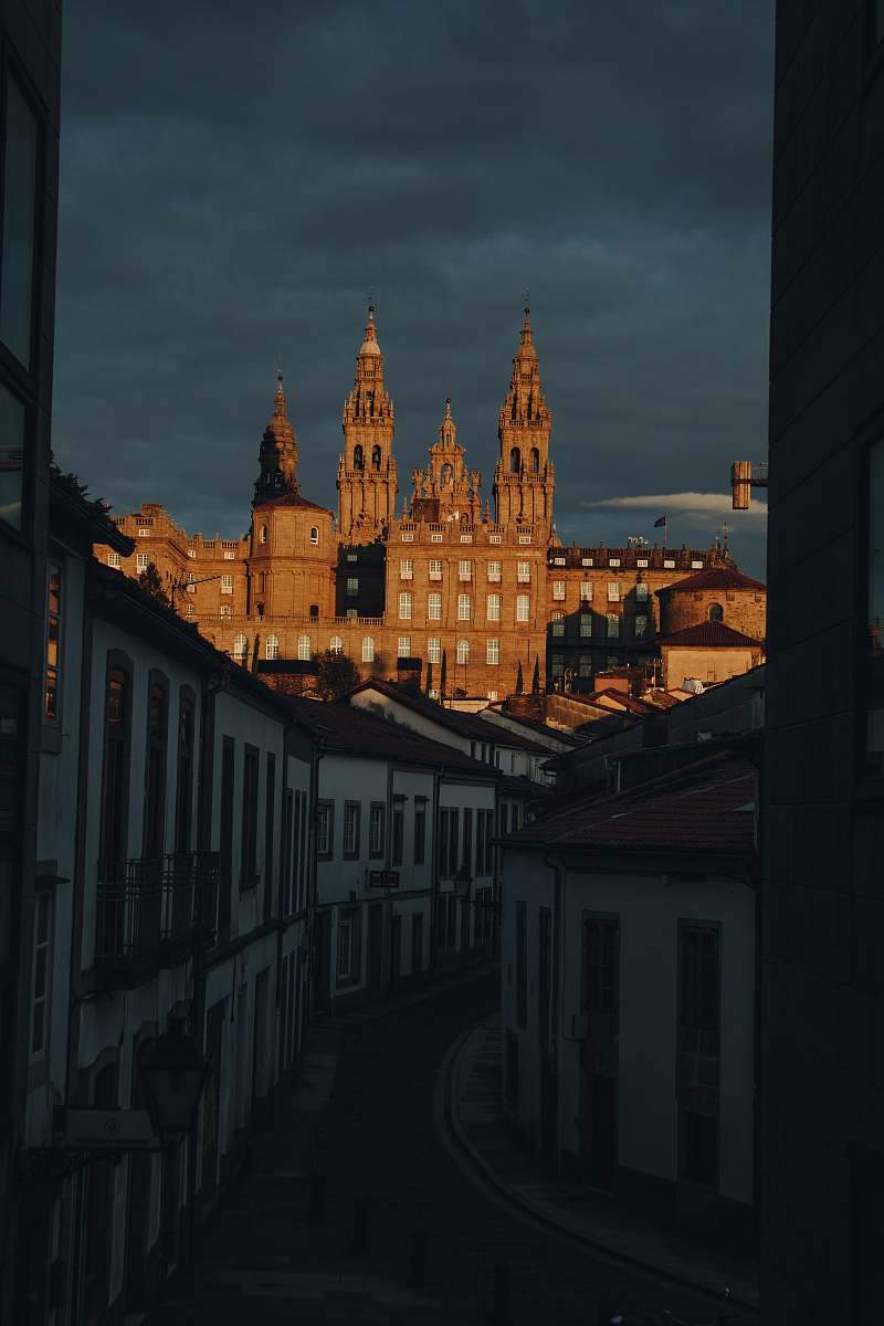 building brown and white buildings at n ight spire