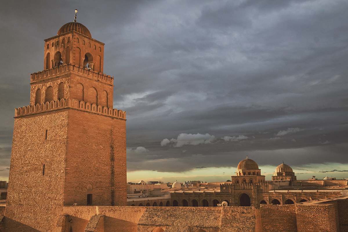 building brown castle under gray skies dome