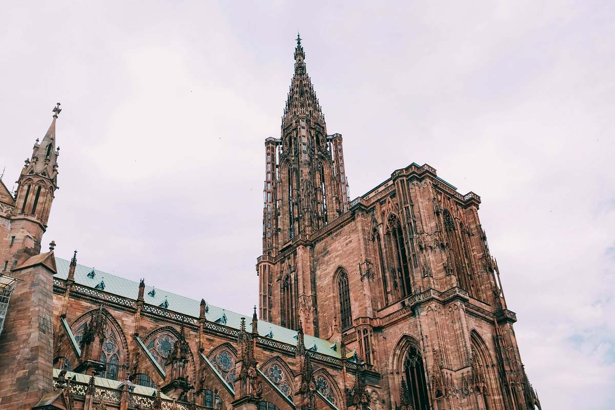 building brown cathedral during daytime spire