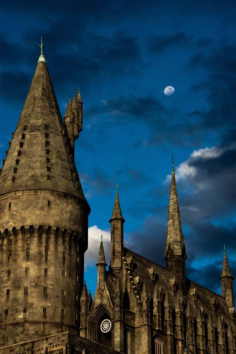 tower brown concrete building during nighttime steeple