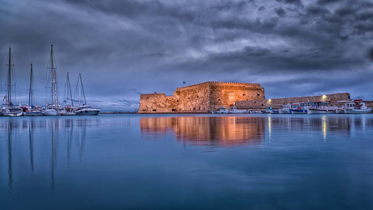 building brown concrete building on sea castle