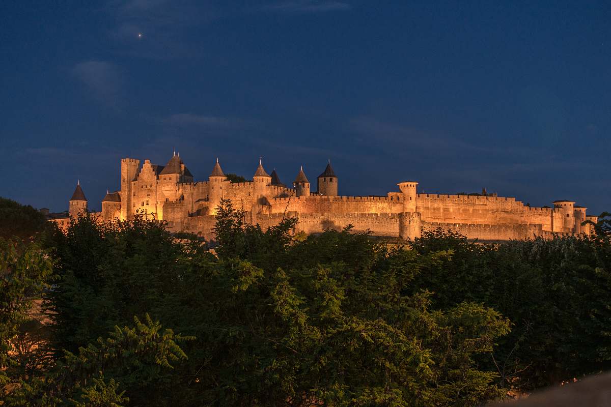 building brown concrete castle at night castle