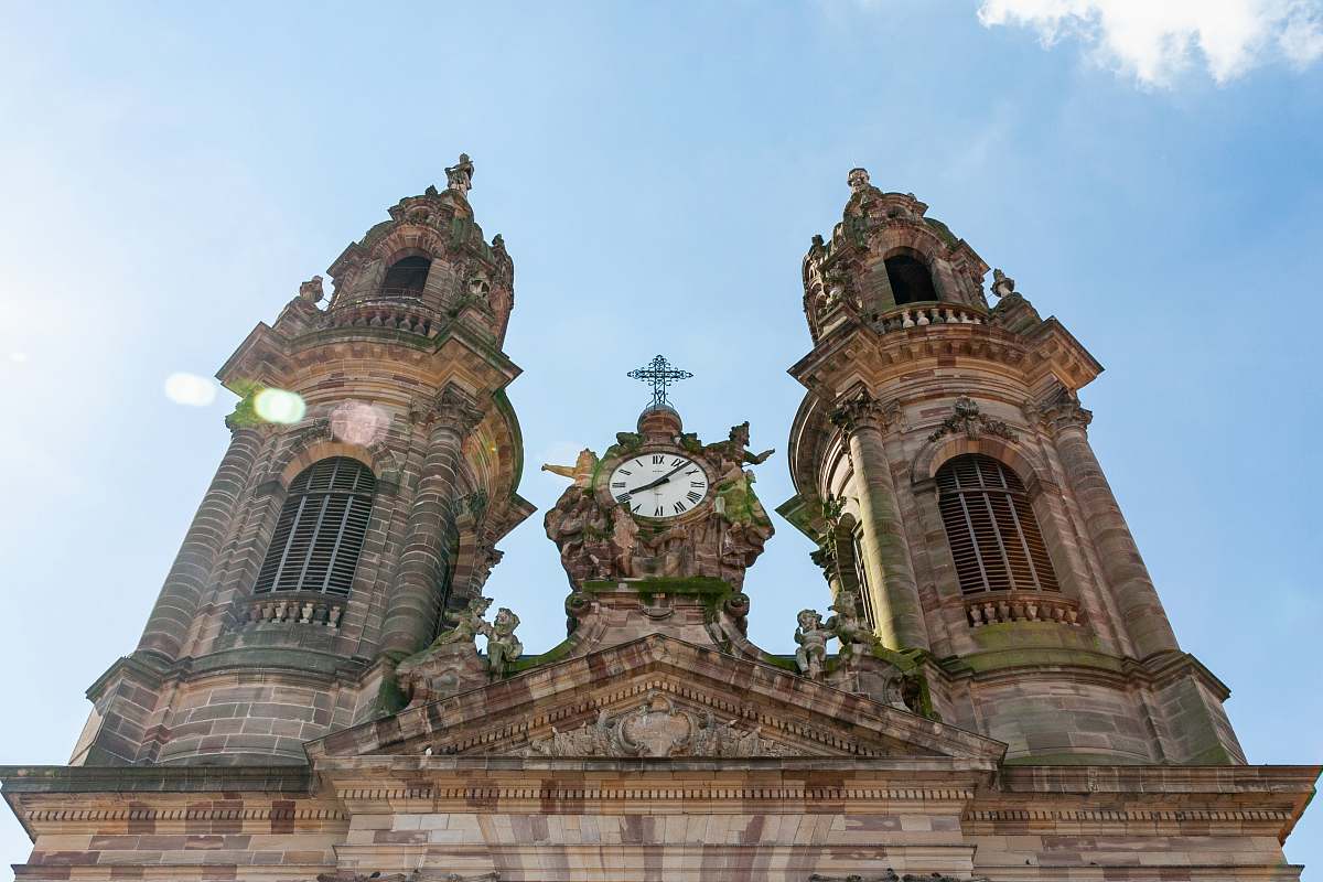 building brown concrete church during daytime tower