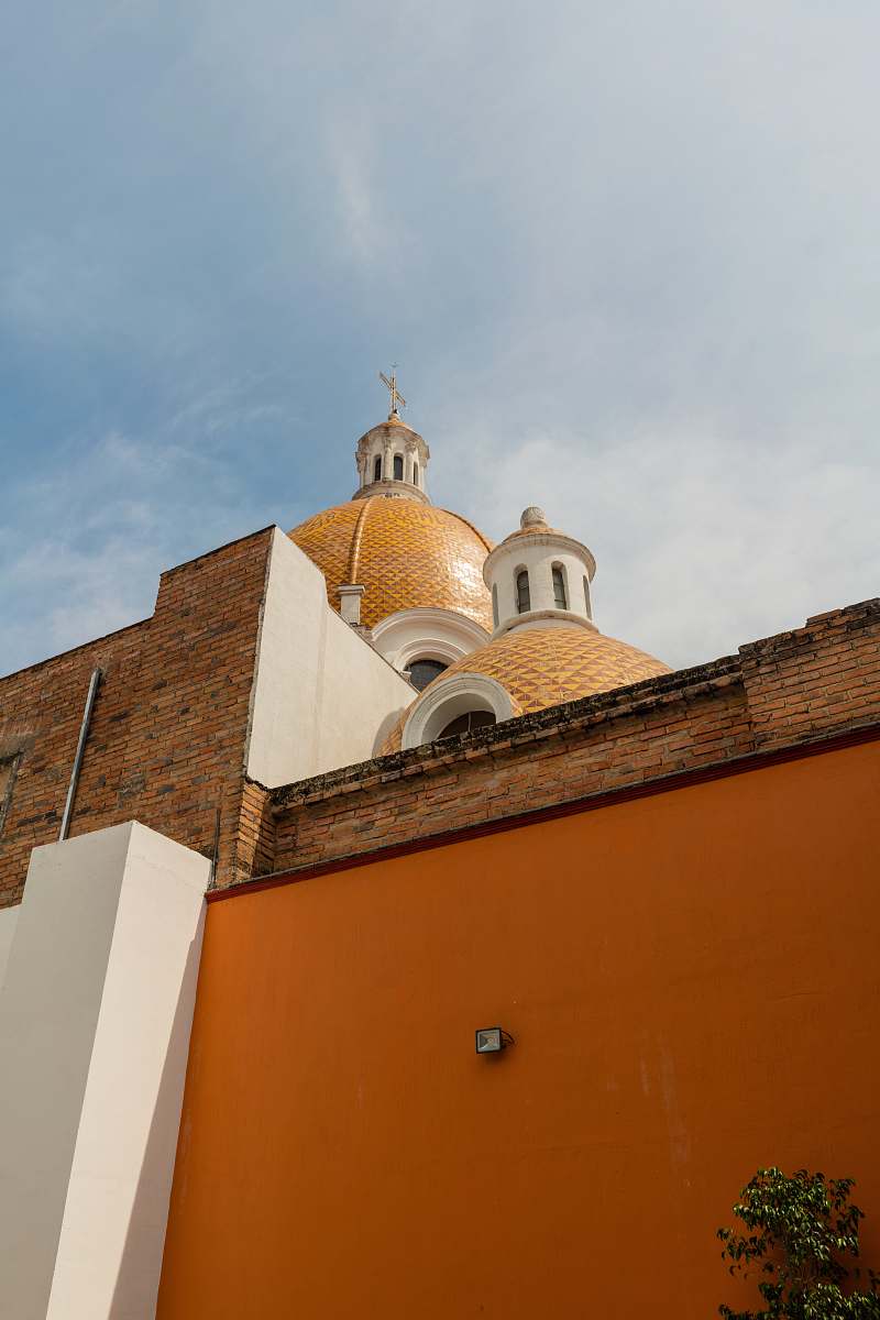 building brown mosque at daytime dome