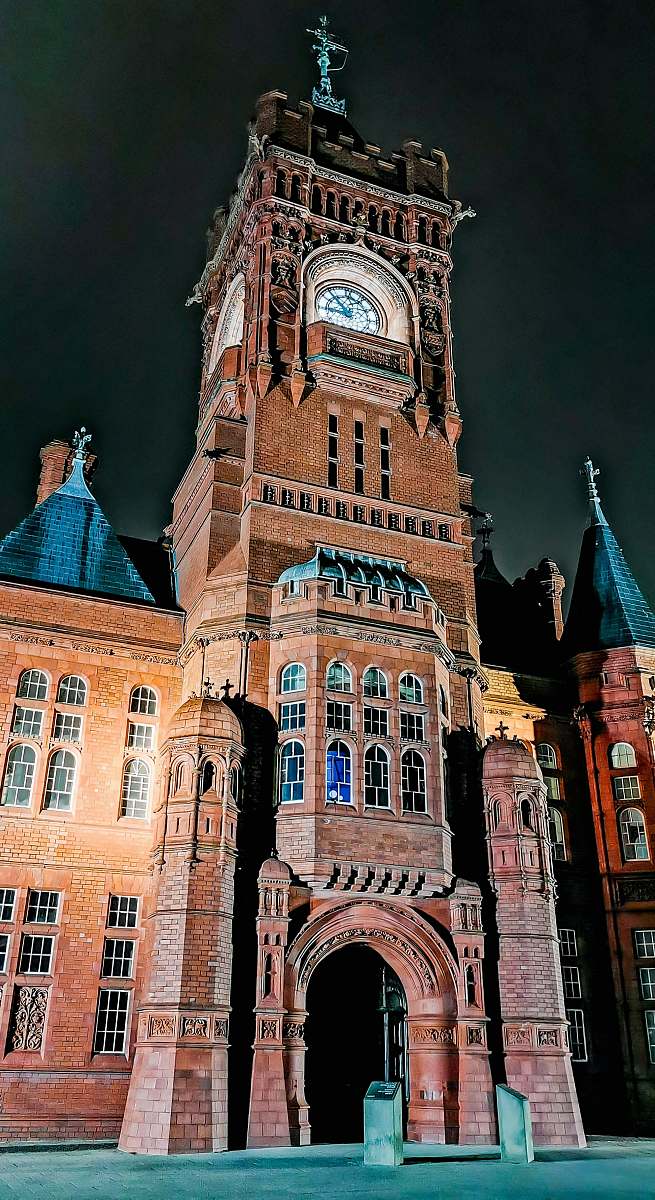 building brown tower clock at night tower