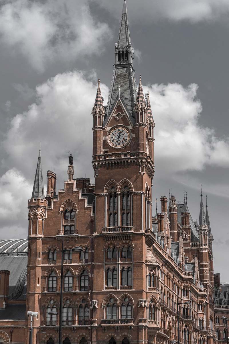 building building with clock tower during day tower