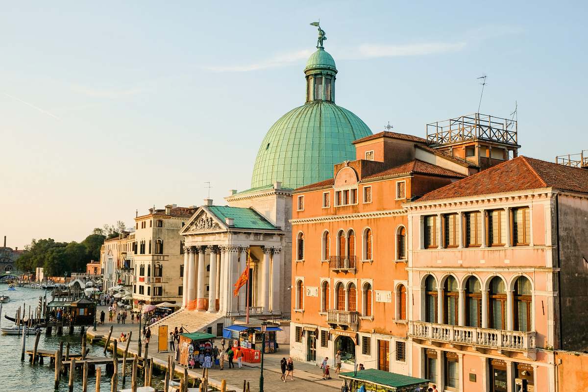 building buildings beside body of water at daytime dome