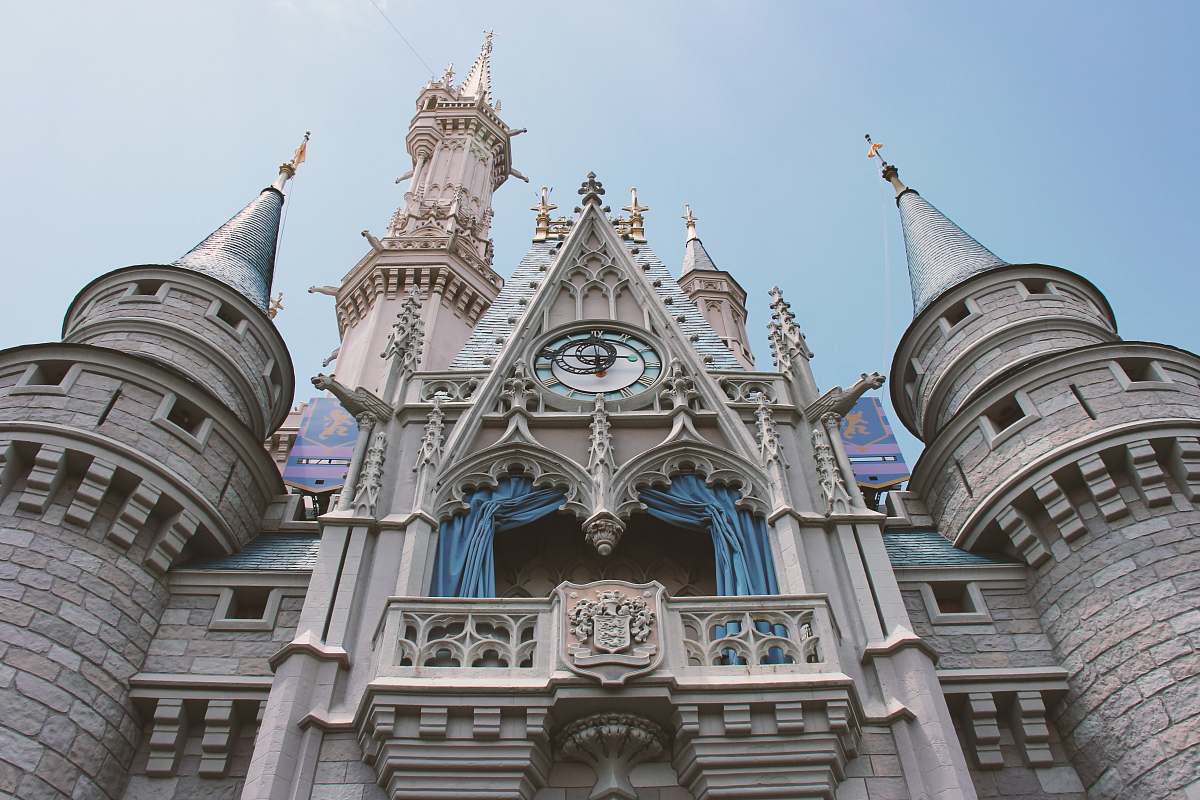 building close-up photography of castle during daytime spire