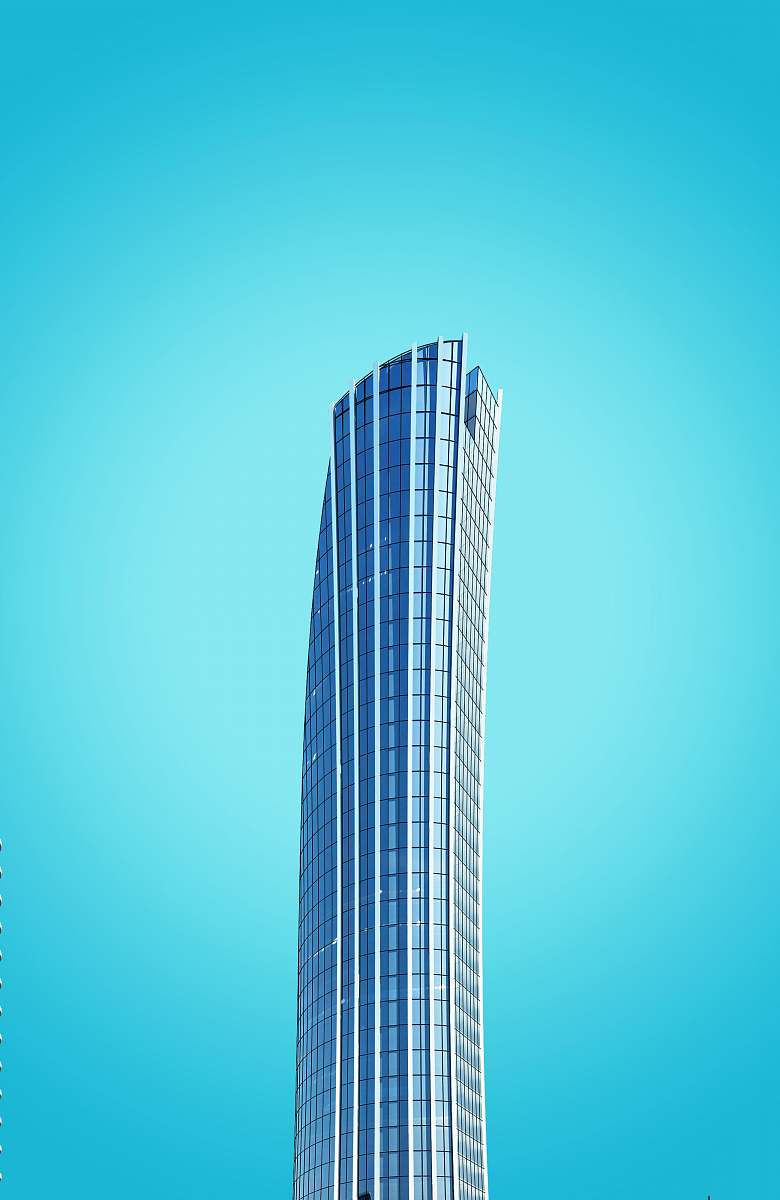 building curtain-wall high-rise building under blue sky urban