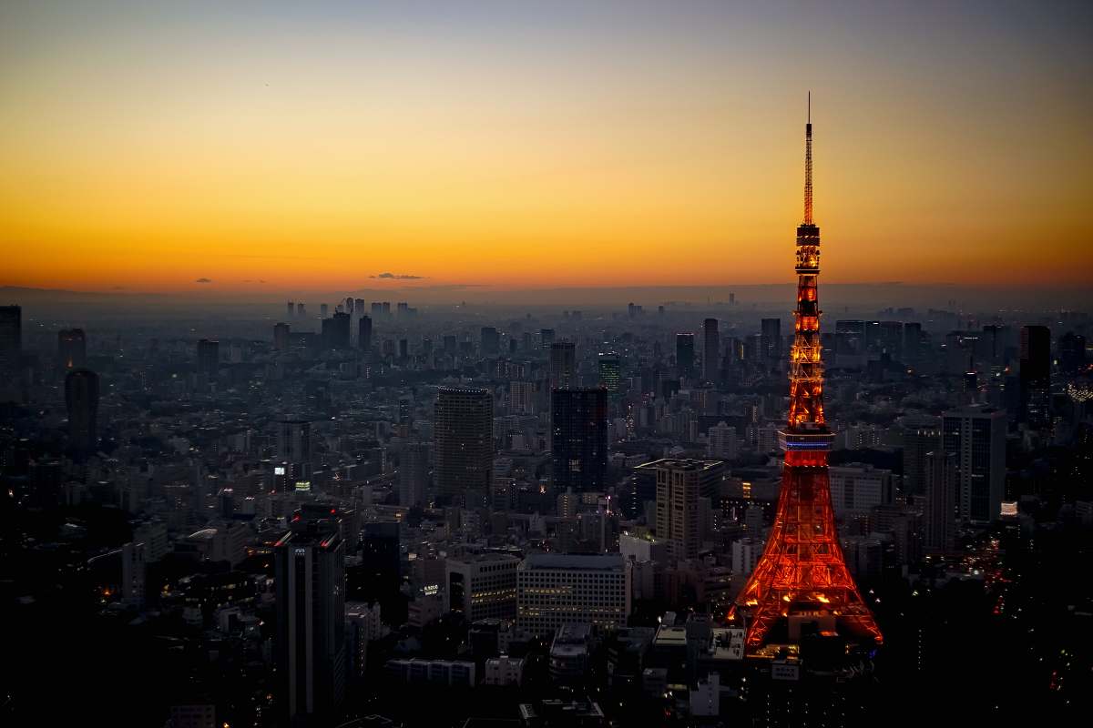 building Eiffel Tower near buildings spire