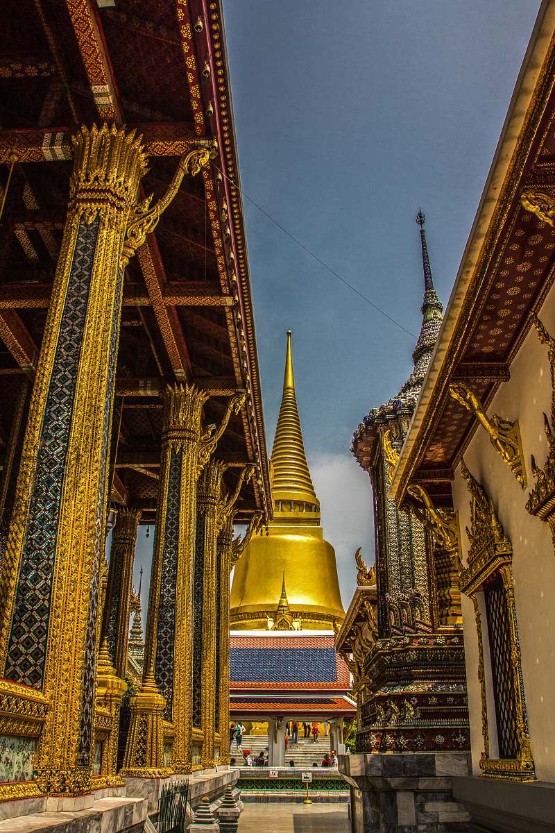 building golden temple under blue skies during daytime temple