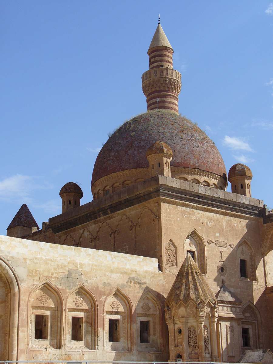 building gray and brown mosque during daytime dome