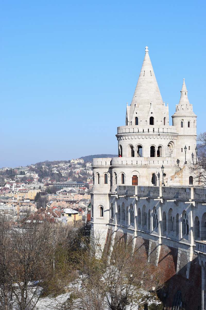 steeple gray castle under blue sky tower