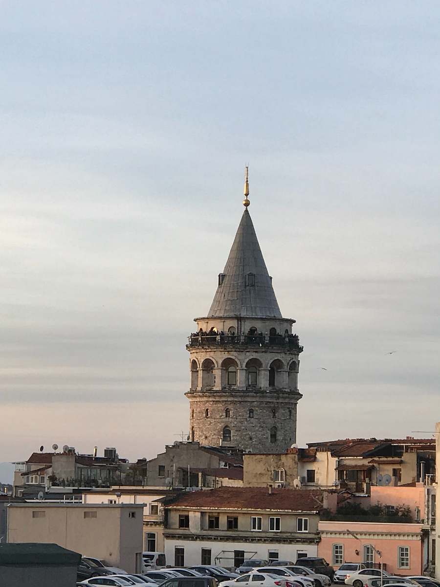 steeple gray concrete building at daytime tower