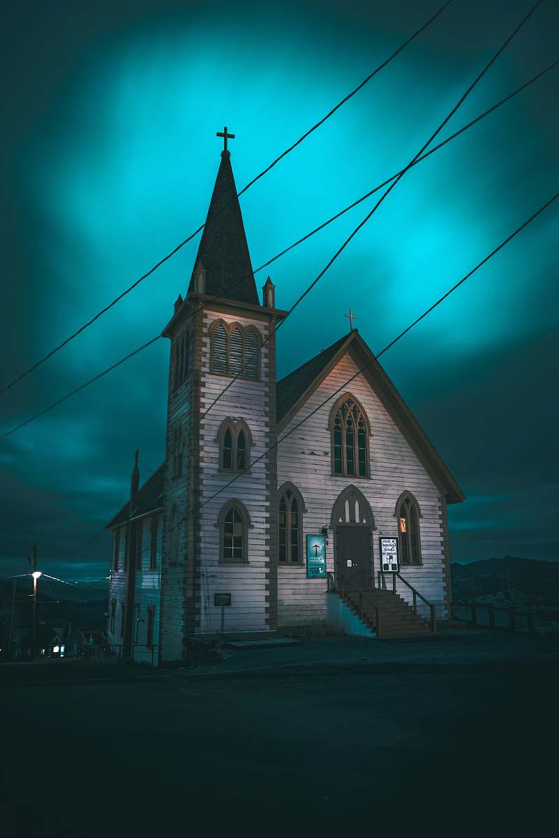 building gray concrete cathedral at night tower