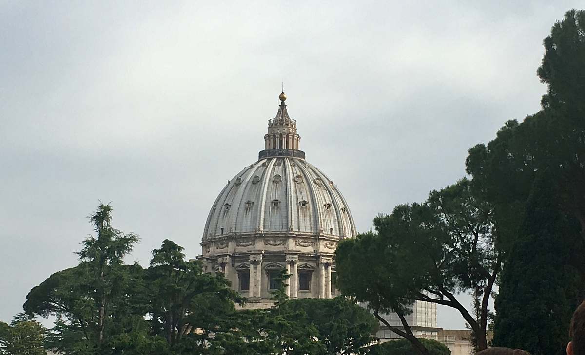 building gray dome building under white sky dome