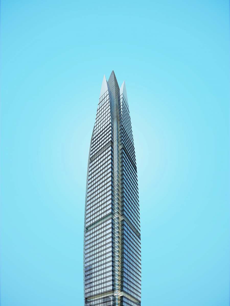building gray high-rise building under blue sky urban
