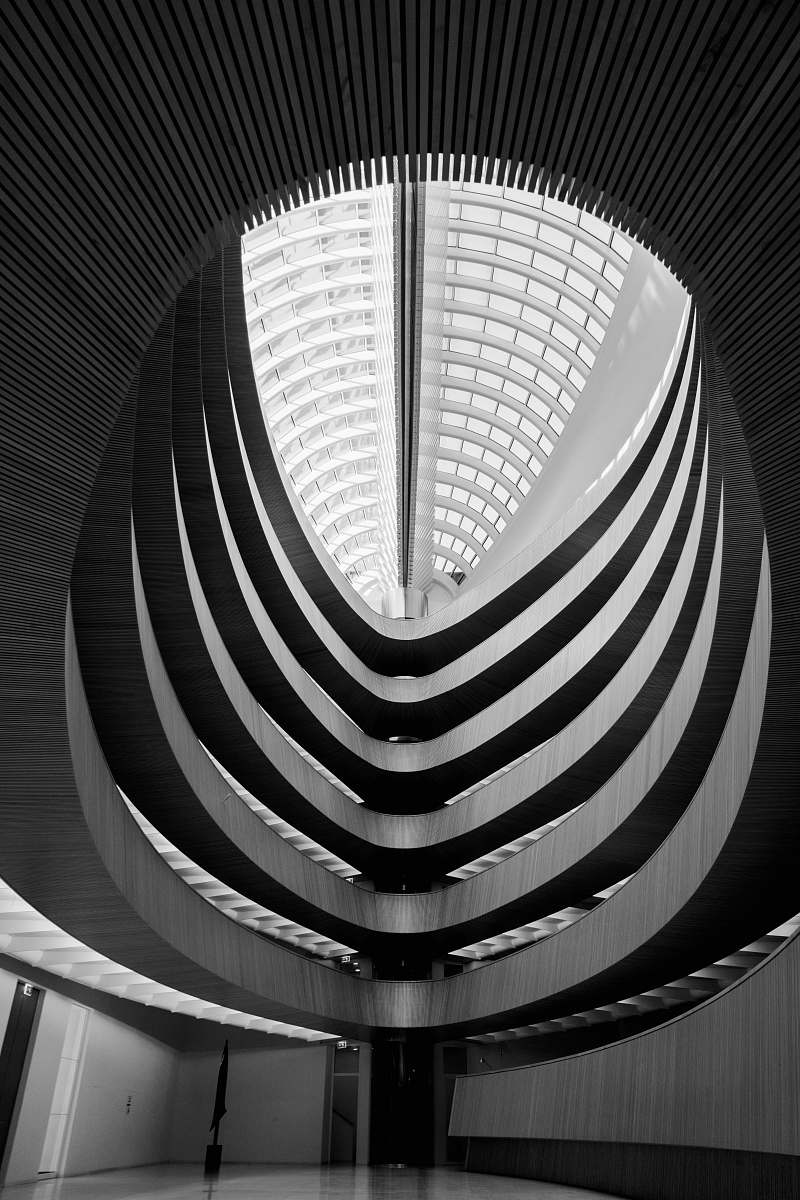 building grayscale photo of concrete building interior black-and-white