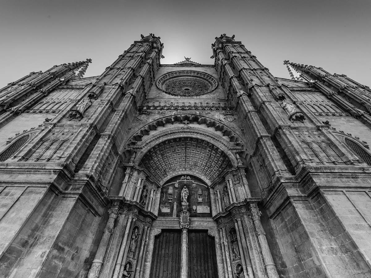 black-and-white grayscale photo of low angle photo of concrete building church