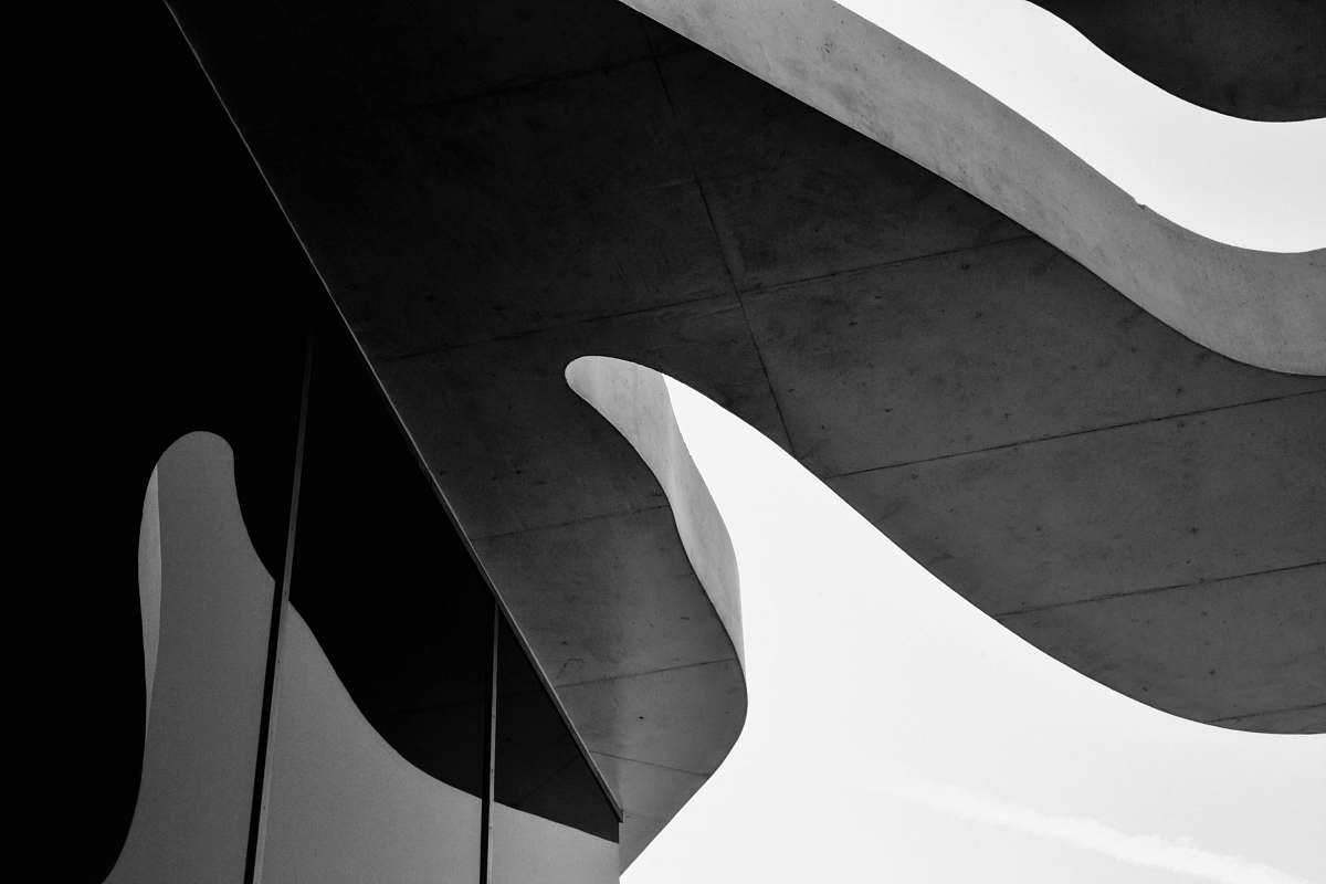 building grayscale photo of shadow of building black-and-white
