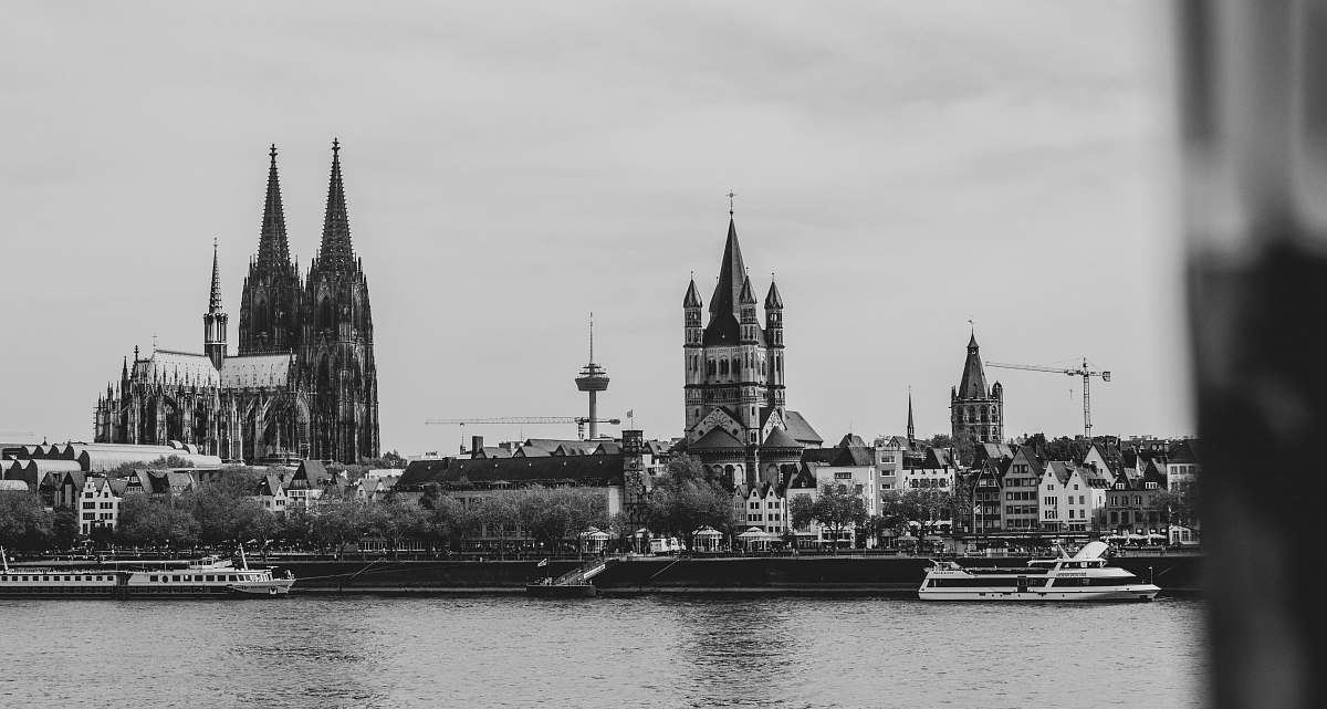 black-and-white grayscale photography of buildings tower