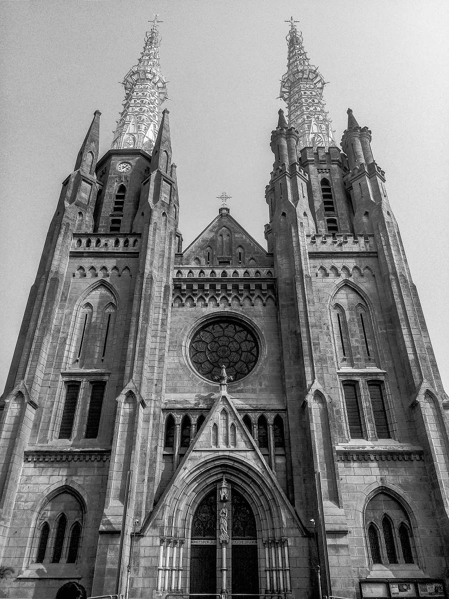 spire grayscale photography of cathedral black-and-white