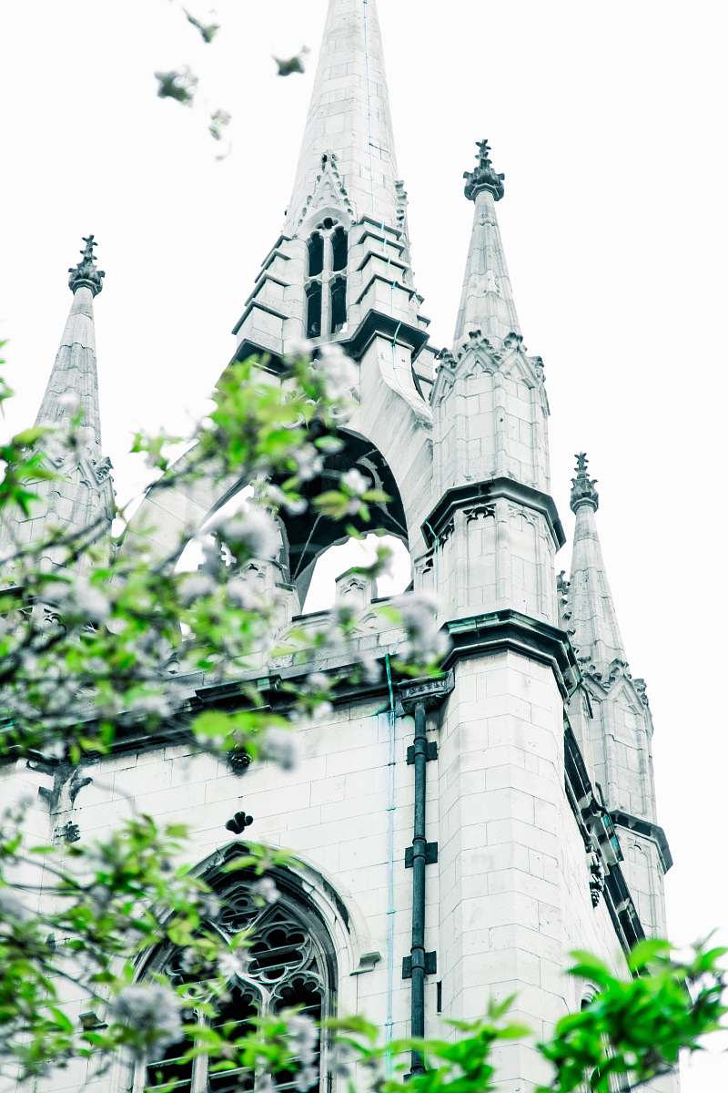 spire grayscale photography of church during daytime building
