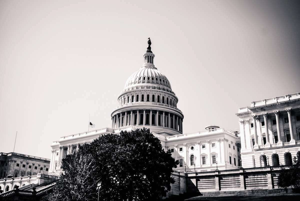 building grayscale photography of U.S. Capitol Hill dome