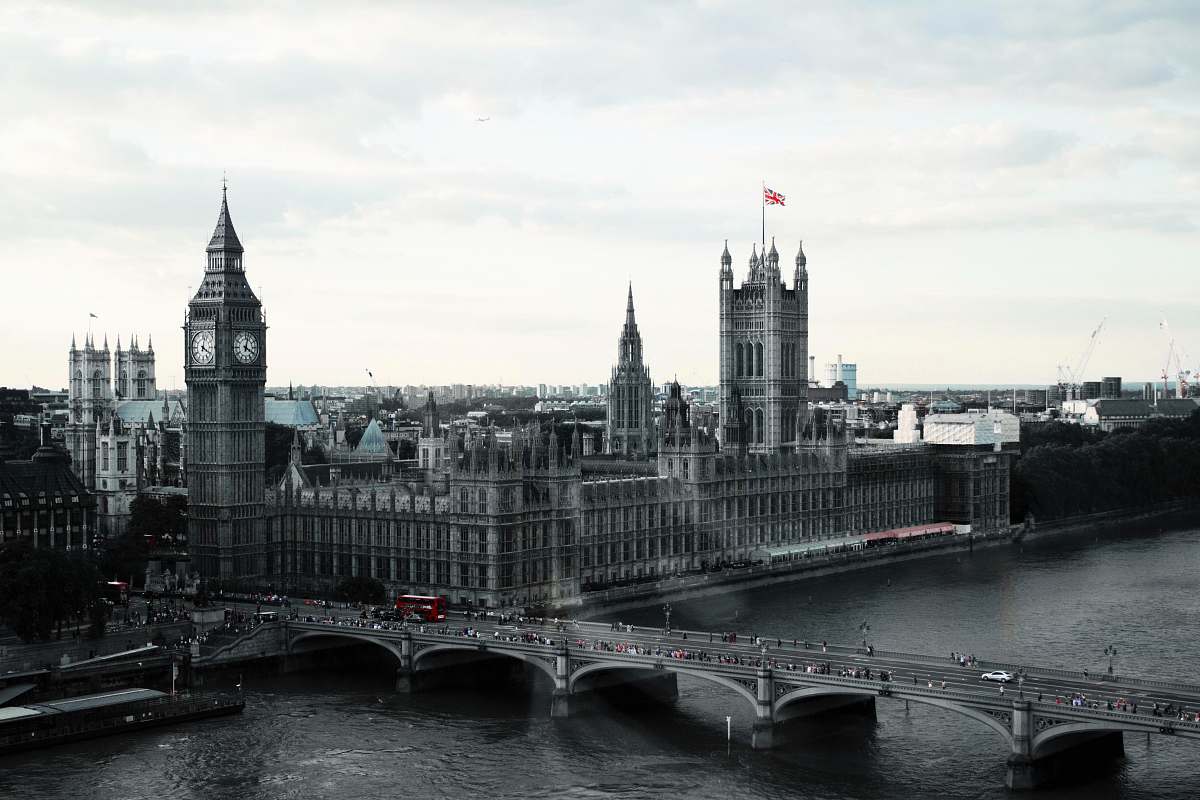 building grayscale photography of Westminster Palace tower