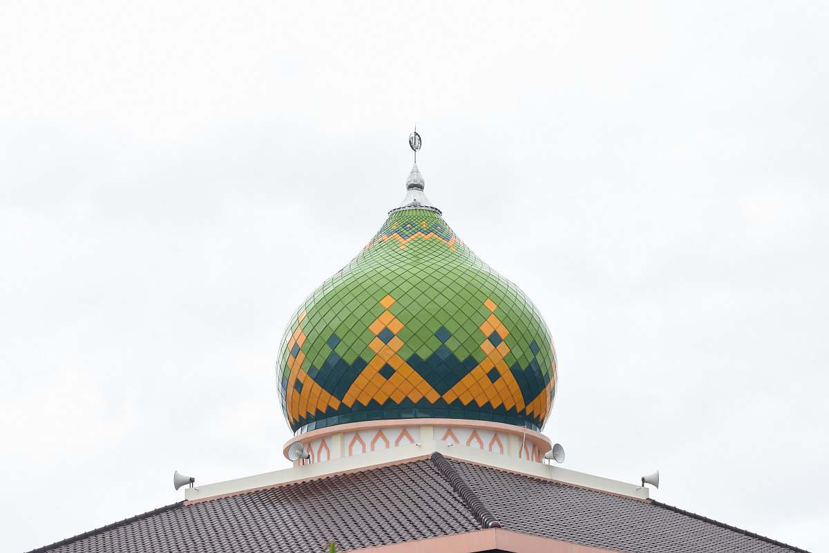 building green and yellow temple dome