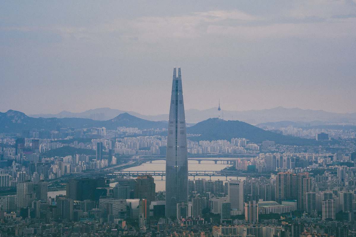 Building Grey Concrete Buildings During Daytime Spire Image Free Photo