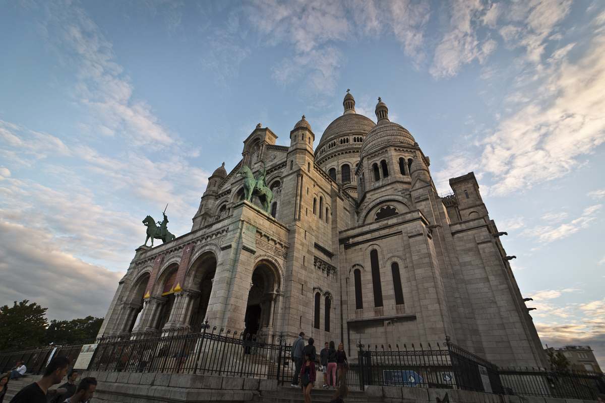building grey concrete church during daytime dome