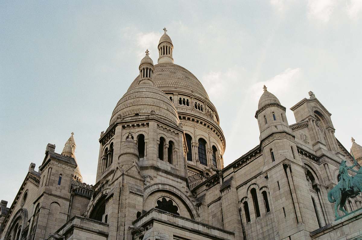 building grey concrete domed building during daytime dome