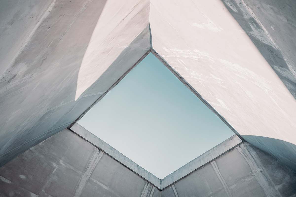 building high-angle photography of building view from inside at daytime grey