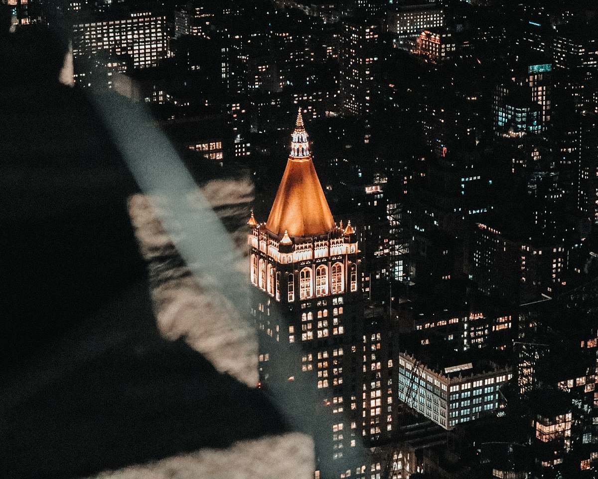 building high rise building view at night spire