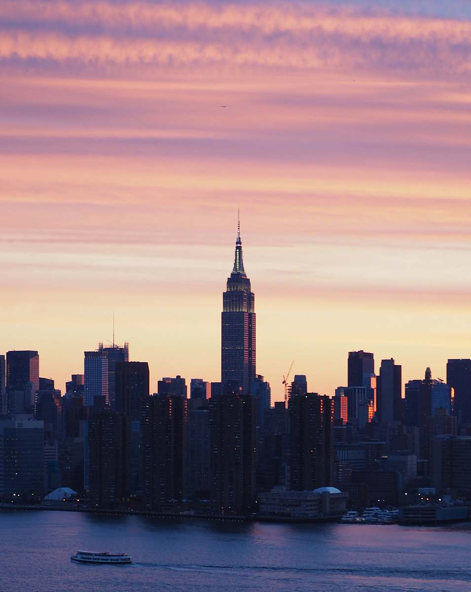 building high rise buildings during golden hour tower