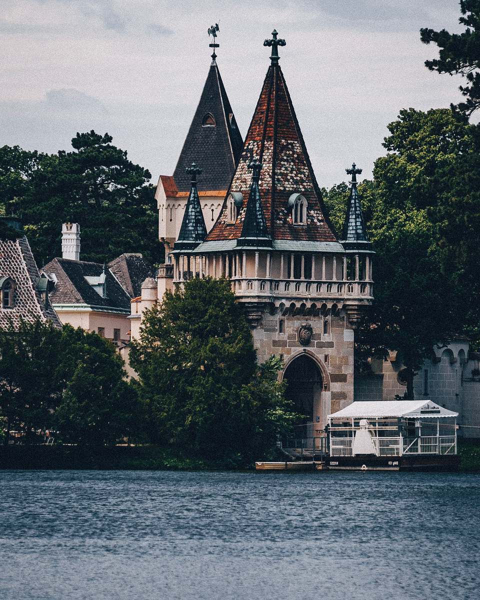 building house near body of water spire