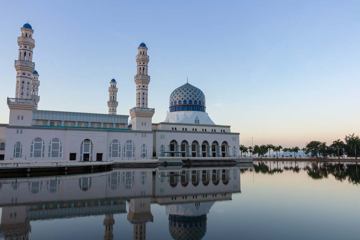 Experience the breathtaking beauty of a mosque dome set against a stunning landscape in Brunei. This captivating image captures the intricate architectural details and vibrant colors of the dome, making it a perfect addition for travel blogs, cultural articles, or religious studies. Whether you're illustrating a piece on Islamic architecture or showcasing the allure of Brunei, this image embodies serenity and grandeur.