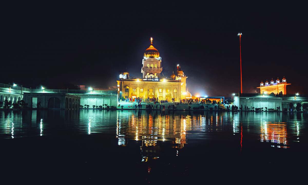 building lighted building near body of water dome