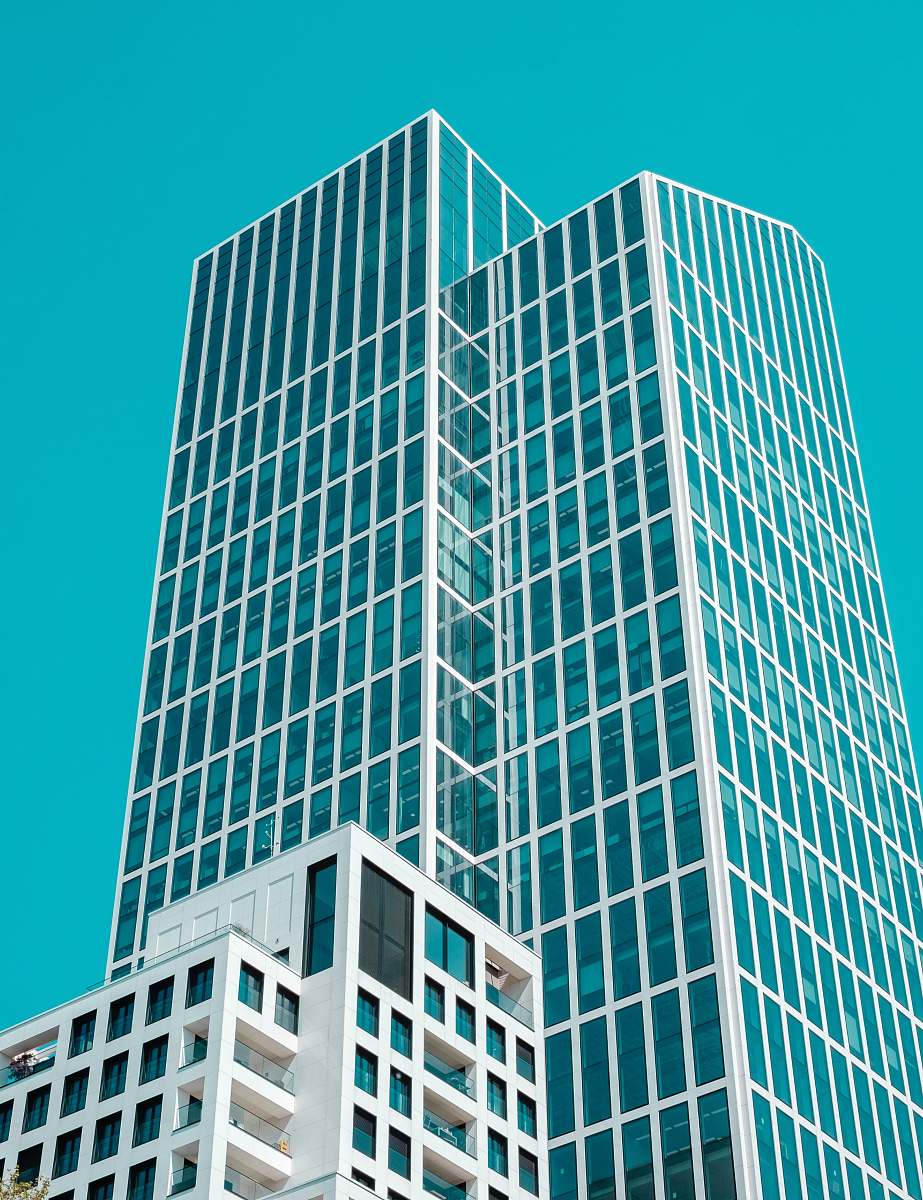 building low angle photo of white building city