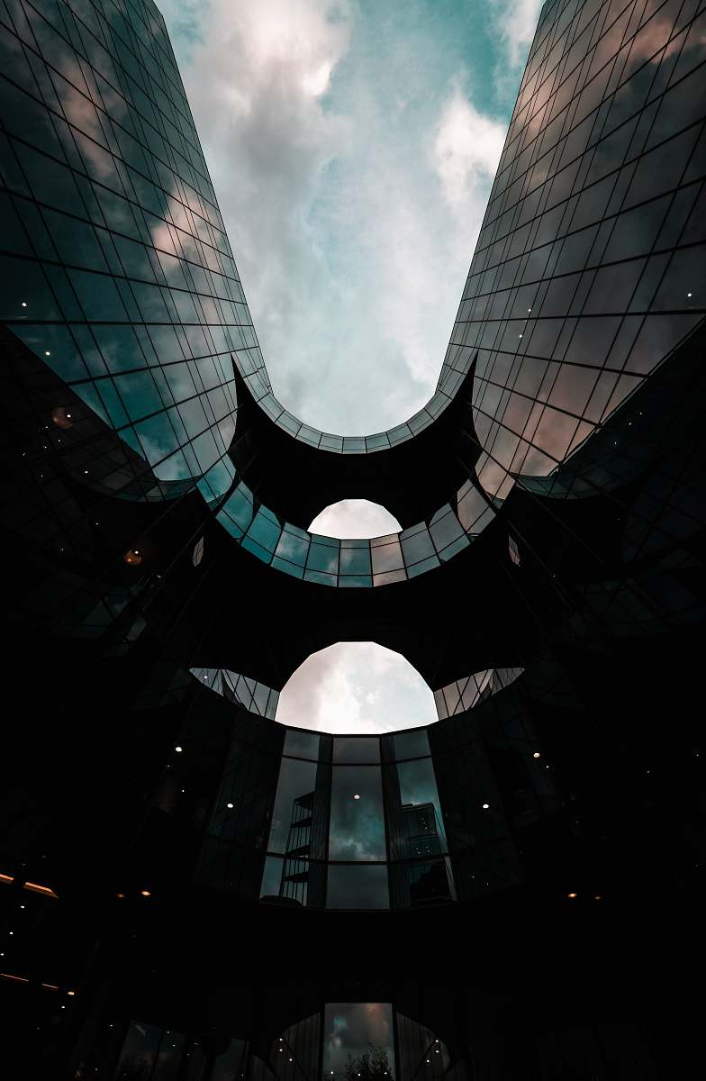 building low angle photography of architectural structure during daytime window