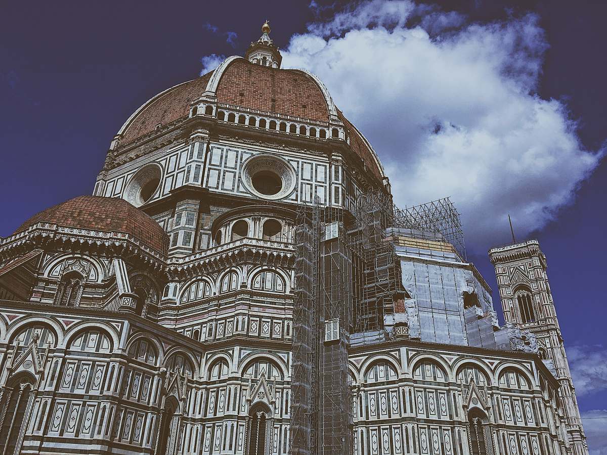 building low angle photography of brown church dome
