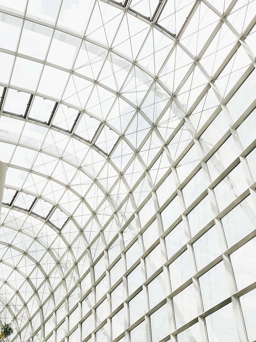 building low angle photography of clear glass ceiling window