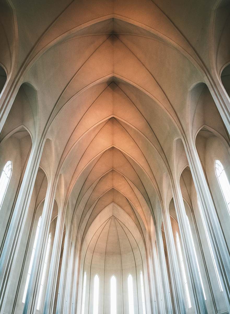 building low-angle photography of concrete building arch