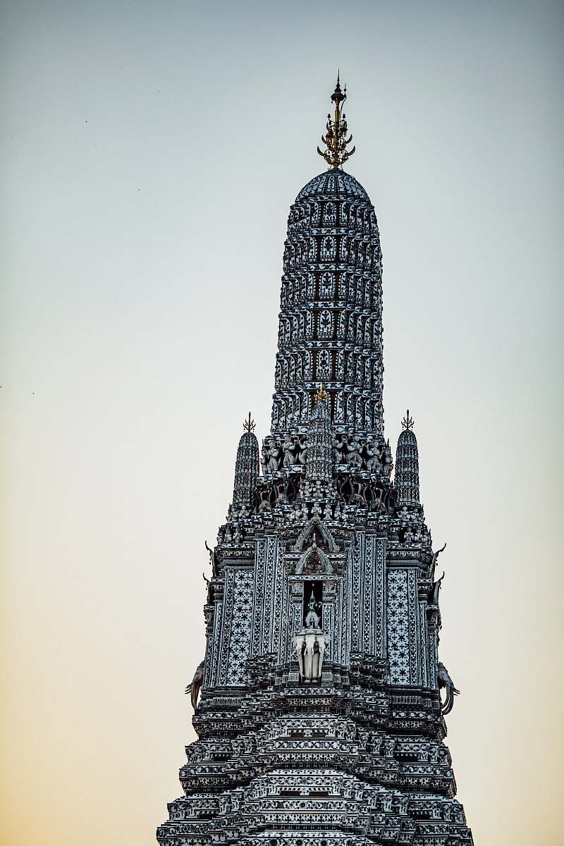 building low-angle photography of gray building spire